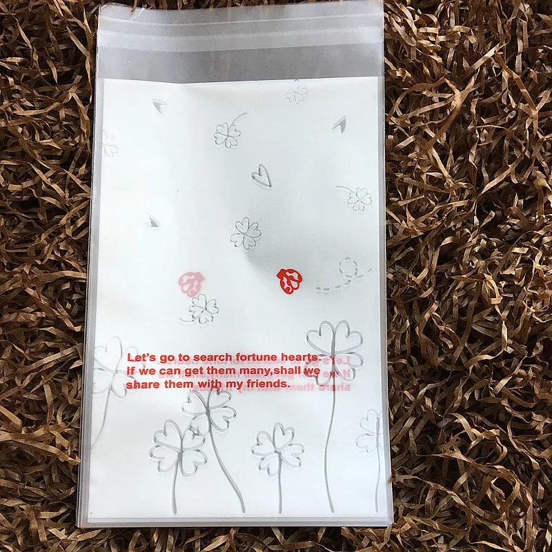 

100pcs 8*12cm Food Grade Frosted Plastic Cookie Bags White Four - Leaf Clover Cake Dessert Packaging Bags Wedding Candy Bag