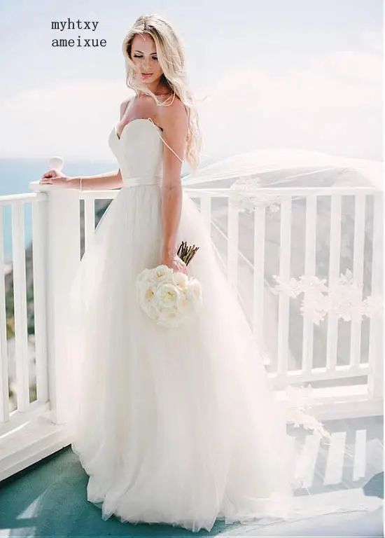 

Beach Wedding Dresses Cheap Spaghetti Straps Tulle Backless Lace Boho Dubai Arabic Wedding Gown Bridal Vestido De Noiva 2019