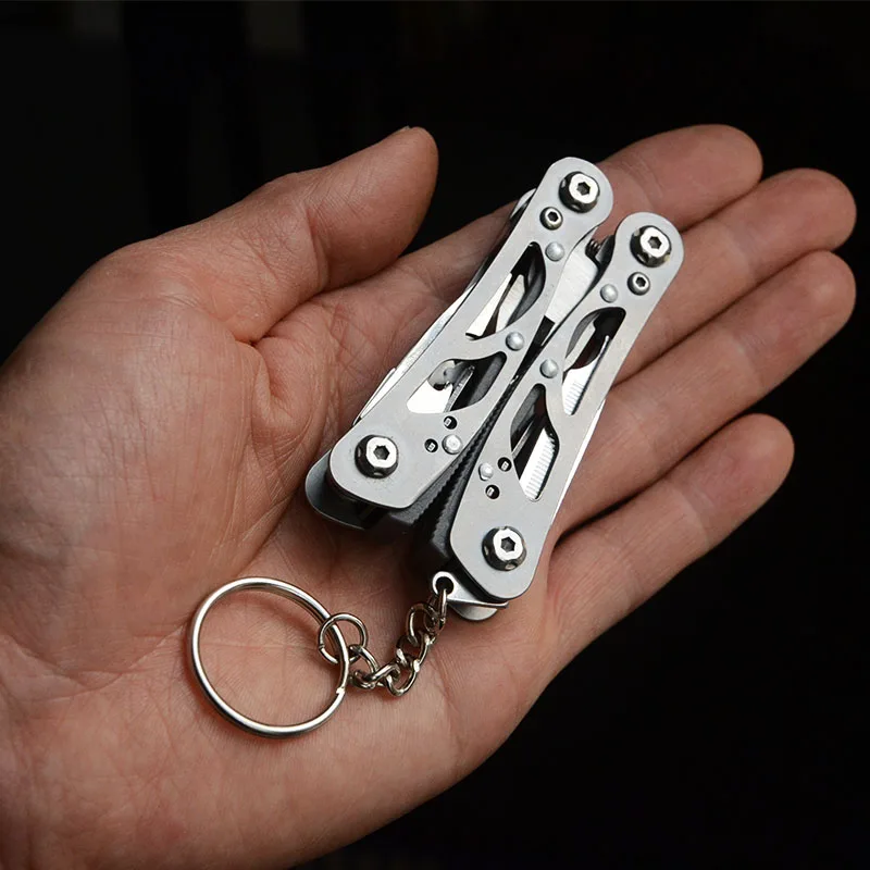 في الهواء الطلق التخييم بقاء أدوات Multitool التكتيكية كماشة تنوعا إصلاح للطي مفك العسكرية الفولاذ المقاوم للصدأ EDC والعتاد