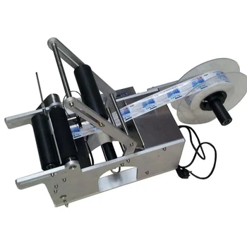 

MT-50 round bottle labeler with the magic eye for transparent label