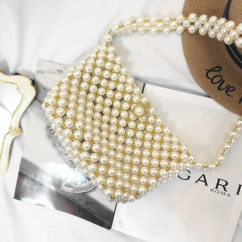 2019 spring and summer new women's bag bag popular pearl women's bag seaside holiday oblique cross small bag