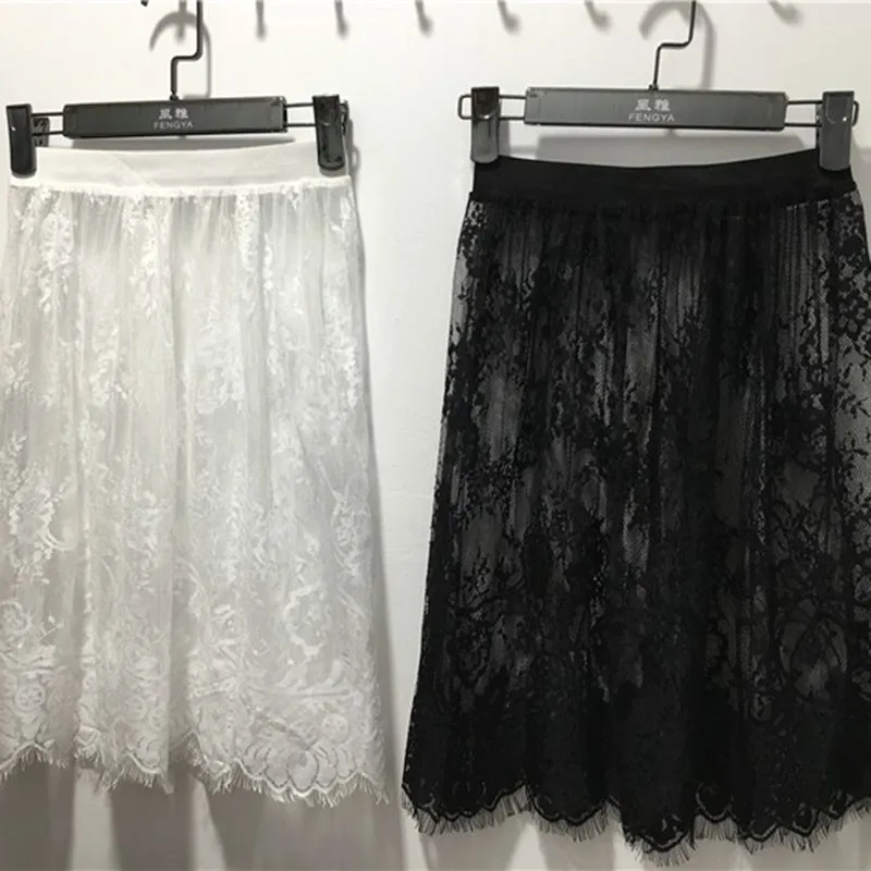 Лидер продаж летние для женщин пикантные кружево юбки для модные однотонные повседневное юбка из прозрачной ткани выдалбливают Короткие