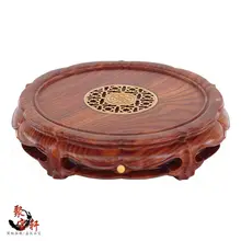 woodcarving handicraft circular base of real wood of Buddha stone are recommended vase home furnishing articles rosewood carving annatto handicraft circular base of real wood of buddha stone are recommended vase furnishing articles
