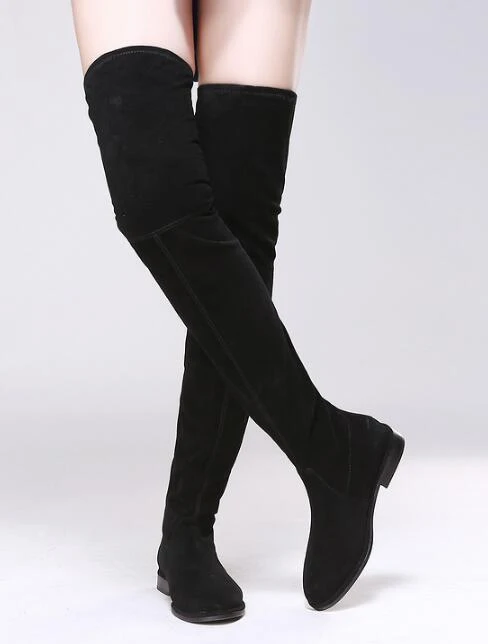 black fabric knee high boots