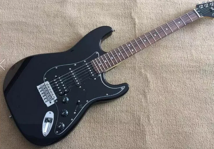 

Custom black guitar, SSH pickup, black guard, free delivery, welcome custom.