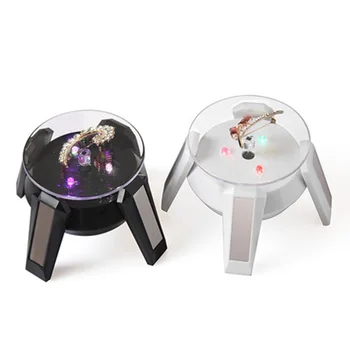 

2pcs! LED light Solar rotation Showcase watches Jewelry mobile phone bearing Turntable rotating tray decoration