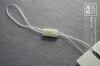 

500PCS high-grade clothes seal/ plastic seal tag/string lock /string hang tag/STRING SEAL