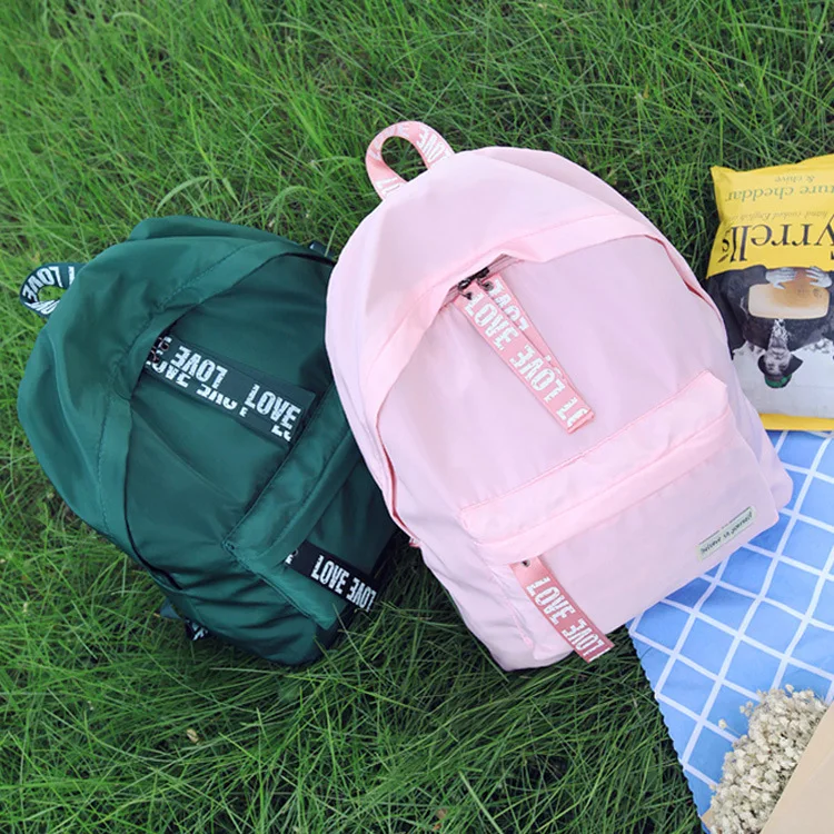 

Korean version of shoulder bag LOVE ribbon schoolbag fashionable nylon bags for leisure female students travel backpack