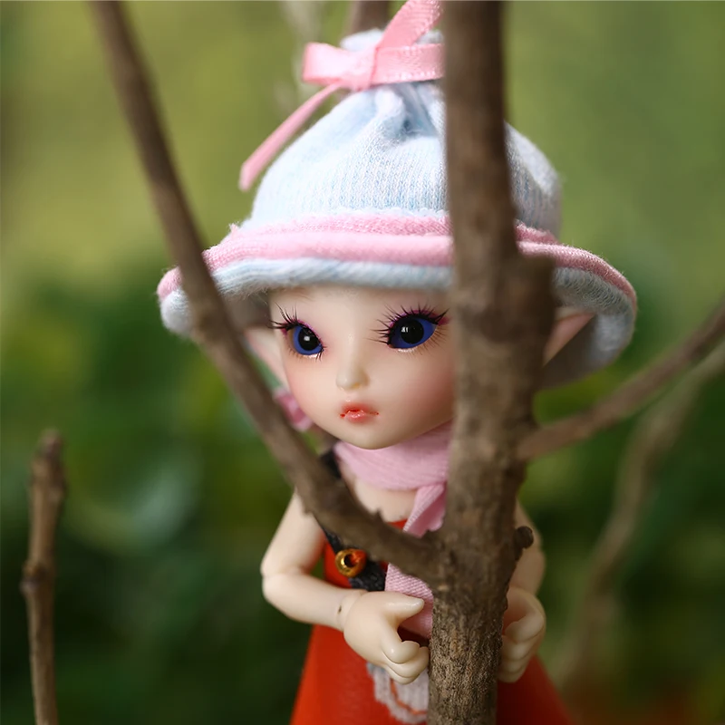 Бесплатная доставка Сказочная кукла Realpuki Roro BJD 1/13 розовая улыбка эльфы игрушки