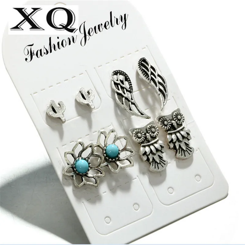 

XQ fashion new mixed set earrings ladies jewelry 4 pairs / set of hollow floral combination retro imitation pearl accessories