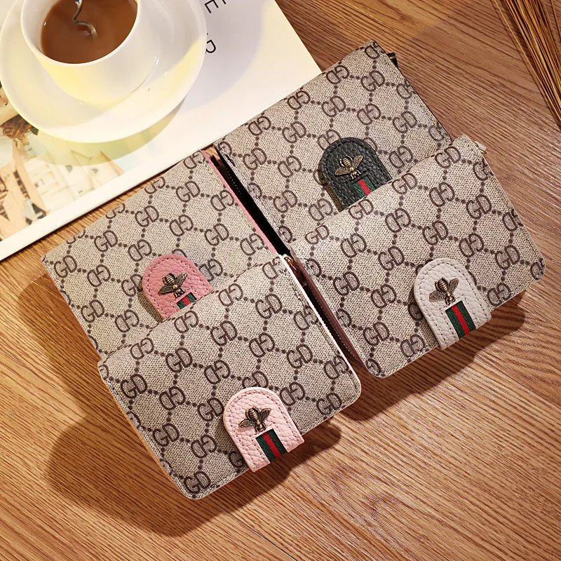 

Korean version of the solid color simple 2019 new ultra-thin bee wallet mini new fashion ladies wallet
