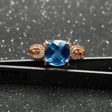 Женское кольцо из серебра 925 пробы с голубым топазом