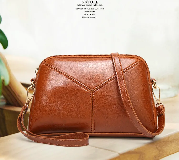 new women's shoulder bag fashion diagonal small square package women's messenger bag version of the stitching hand bag