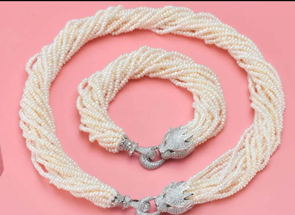 

gorgeous four 10strands5-6mm round white pearl necklace 18"&bracelet 7.5-8