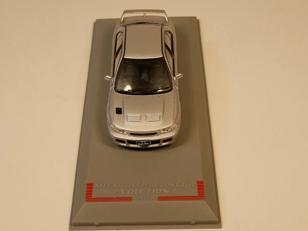 Литой клуб 1:43 поколения GTI Mitsubishi Lancer Evolution 1992 от ixo