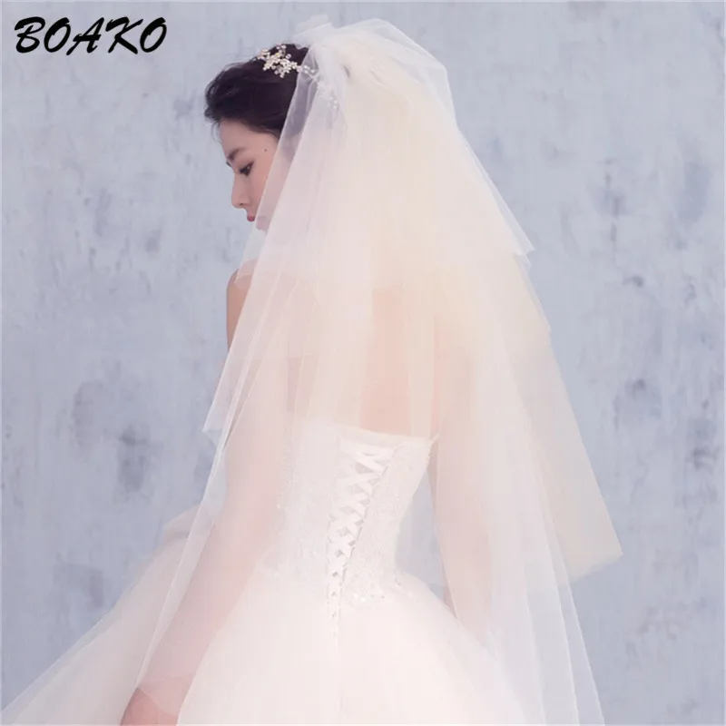 BOAKO Cut Edge Puffy Tulle Bridal Veil Fingertip Length Elegant Wedding Veil With Comb 4 Layer White Champagne Velos De Novia