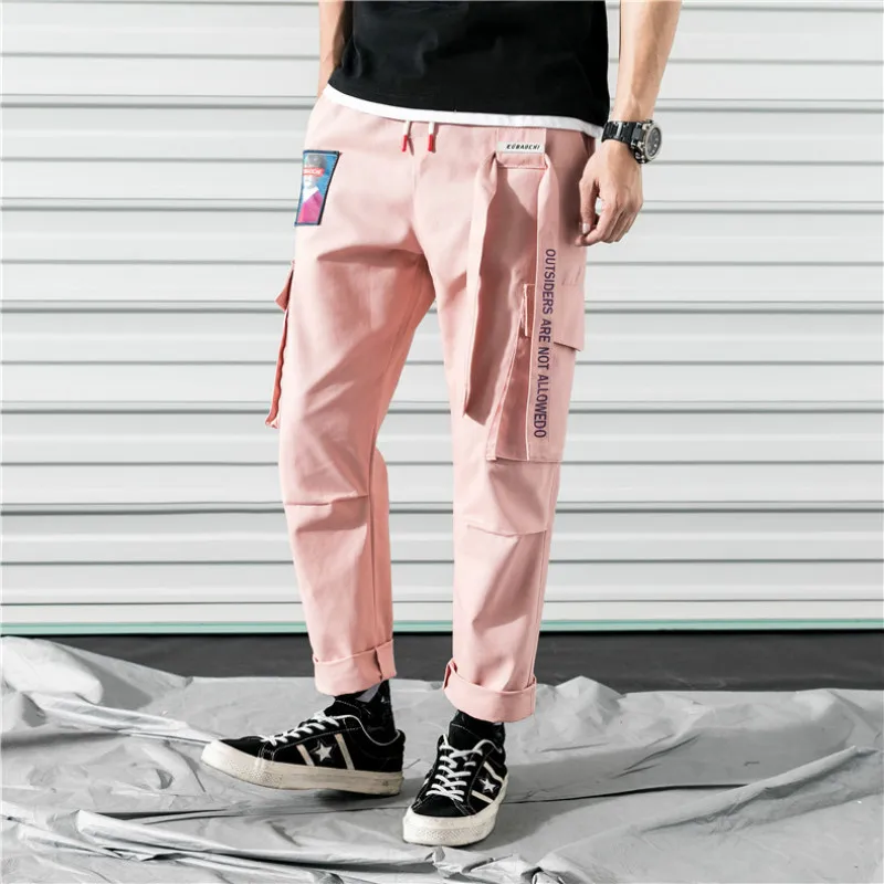 Брюки-шаровары для мужчин; цвет розовый; повседневные мешковатые джоггеры с лентами; тактические брюки в стиле Харадзюку; уличная одежда в стиле хип-хоп; мужские брюки