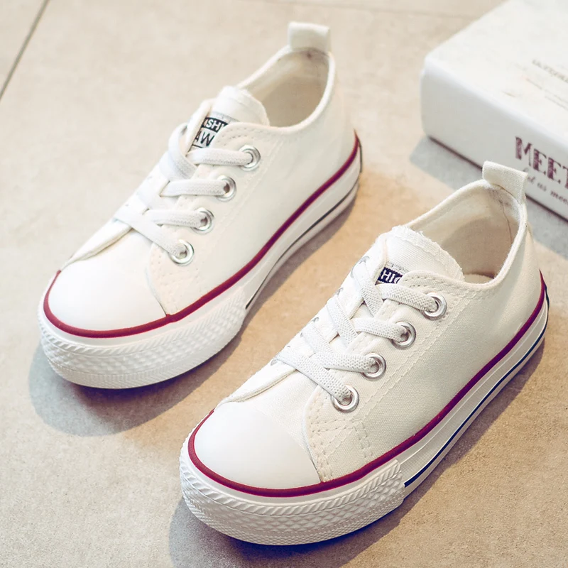 youth white canvas shoes