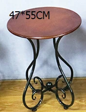 Ou, wrought iron wood coffee table. The balcony leisure small round table. The sofa corner. Small tea table.