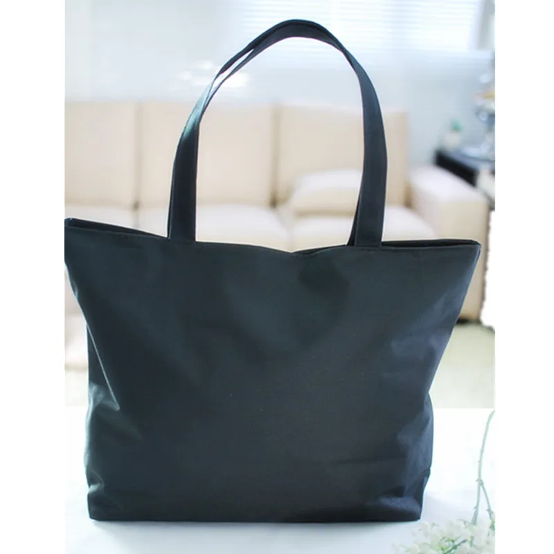 black canvas beach bag
