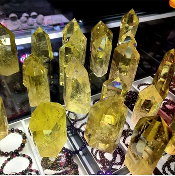 

Natural yellow crystal hexagon magic rod wholesale Brazilian topaz transparent crystal pillars.