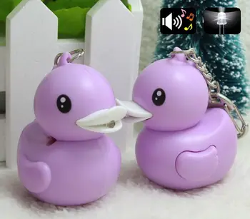 

FREE SHIPPING BY DHL 200pcs/lot Plastic LED 3D Purple Duck Shaped Keychains with Sound Novelty Toy Keyrings for Kids
