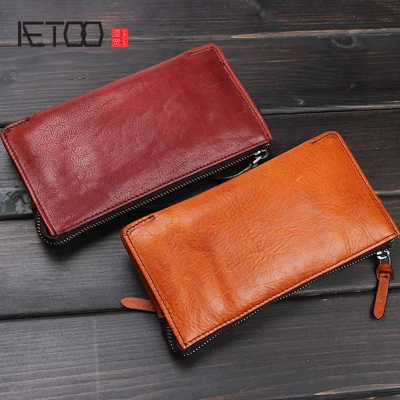 AETOO Vintage handmade leather vertical wallet men and women rivets multi purpose wallet leather ...