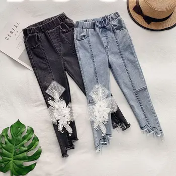 

Children's clothing 2019 spring new girl irregular side bud silk yarn three-dimensional flower design feet jeans