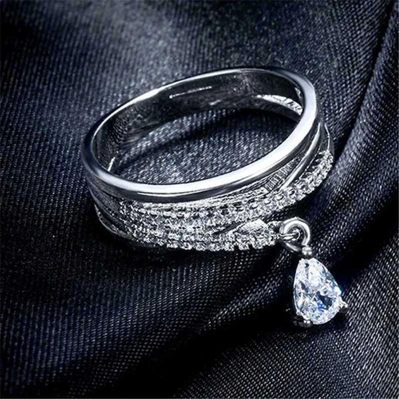 

JUNXIN Luxury Female Water Drop Stone Dangle Wedding Ring Silver Rose Gold Color White Zircon Engagement Cross Winding Ring Gift
