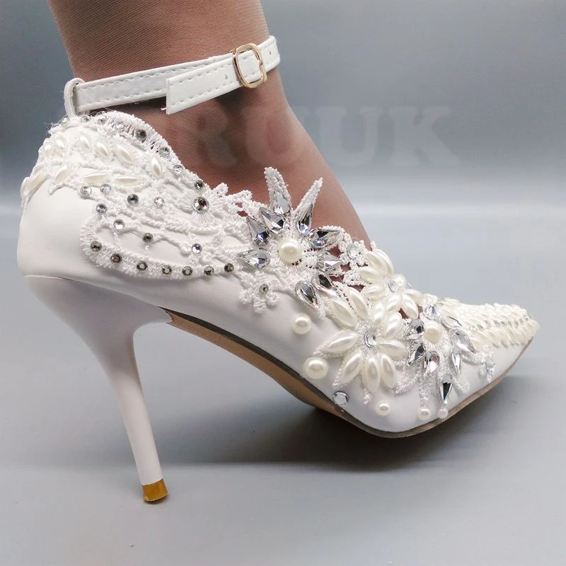womens ivory pumps