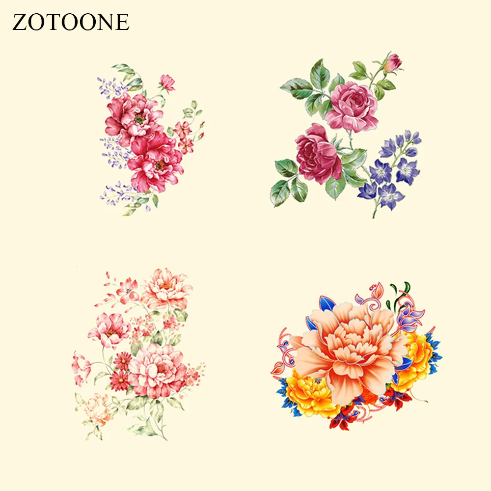 Платье-футболка с принтом Железный На Патчи и цветочной аппликацией ZOOTONE платье в