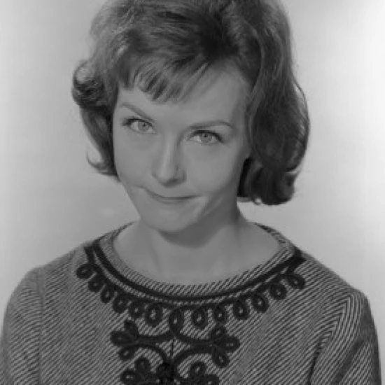 Portrait of young woman looking at camera  studio shot Poster Print (18 x 24)