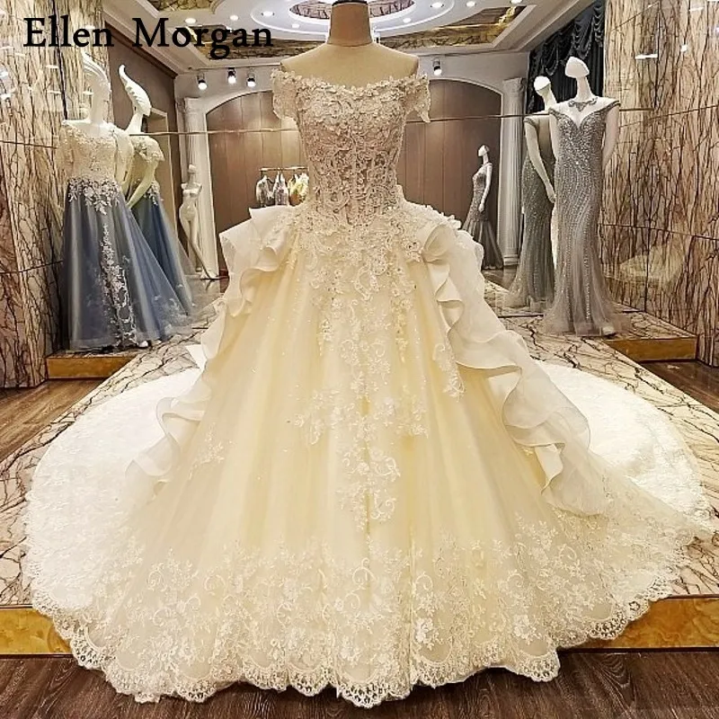 

Elegant Off Shoulder Wedding Dresses 2019 Custom Made Chapel Train Lace Beaded Corset Transparent Puffy Bridal Gowns for Women