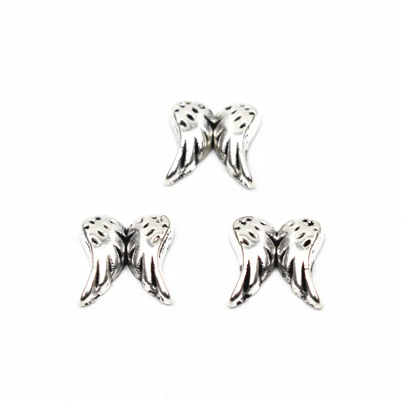 

Hot Sale 20pcs/lot Metal Angel Wing Silver Floating Charms For Living Glass Memory Floating Lockets Bracelet Necklace Jewelry