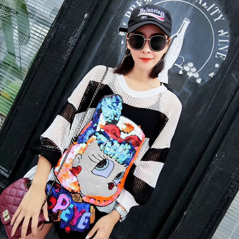 

2018 spring and summer new European station tidal card cartoon cat sequin black and white hollow loose thin sweater