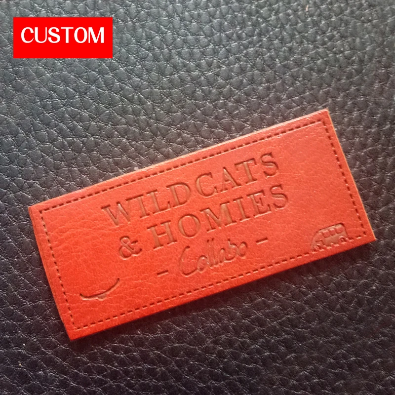 factory private customzied PU leather embossed labels sewing on ladies