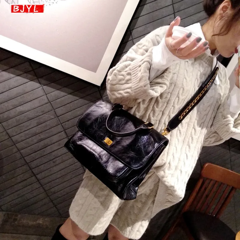 

New fashion Genuine leather Women handbag female briefcase lock buckle shoulder messenger bag large capacity slung tote bag
