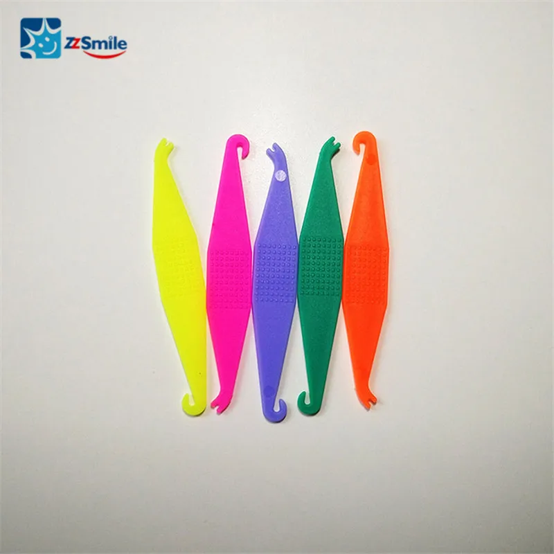 

Dental Orthodontic 50 pcs/bag Different Colors Elastic Placer