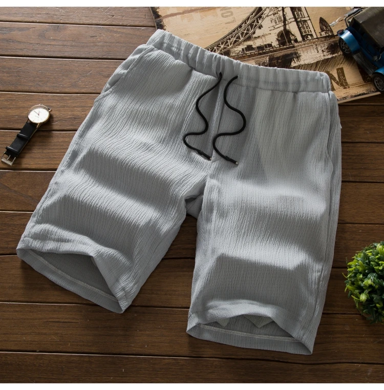 2018 новые летние Для мужчин 2-комплект из двух предметов, хлопок и лен ткани Для мужчин футболки и шнурок шорты, свободные вышивка мужской