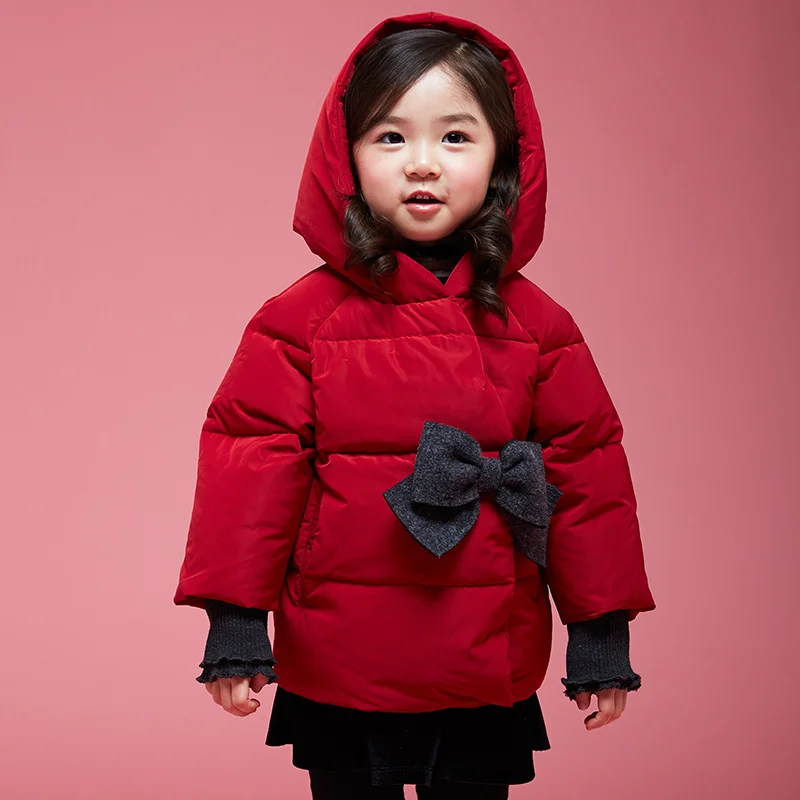 

Winter eiderdown jacket for 2- to 6-year-olds, decorated with a large bow