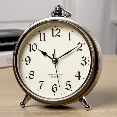 Европейская мода ретро металл отключить будильник прикроватная тумбочка для спальни настольные часы американские простые маленькие часы с подвесным кольцом Q206 - Цвет: colour1