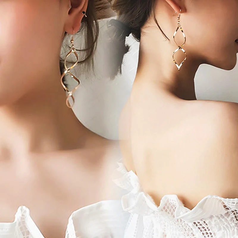 

Summer new product Minimalist joker spiral bending design feeling wave curve earrings pendant earrings female temperament