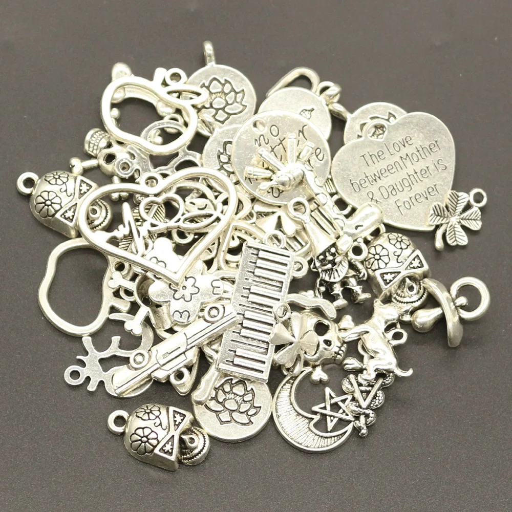 

Hot Sales 100g (50~80pcs)Mixed Antique Silver European Bracelets Pendants Fashion Jewelry Making Findings DIY Handmade Charms