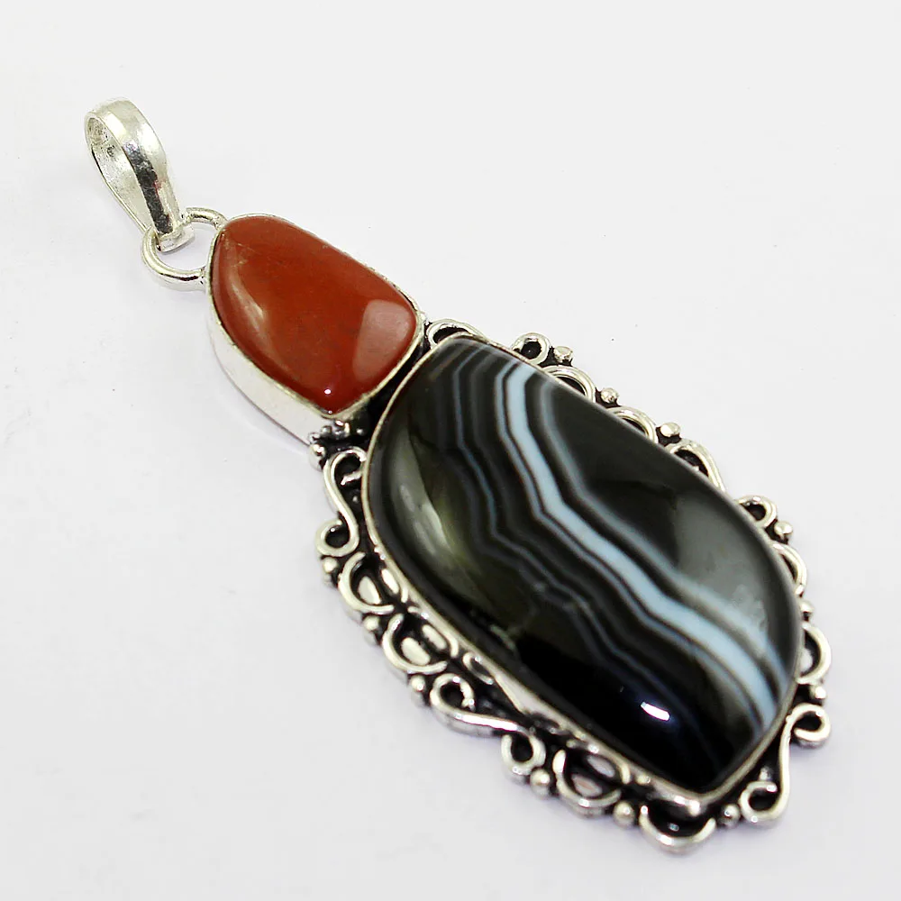 

Botswana Agates & Jaspers Pendant Silver Overlay over Copper ,76mm, P1266