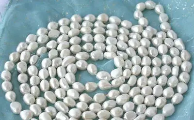 

FREE SHIPPING HOT sell new Style >>>> AAA long 46 "7X9mm baroque white freshwater pearl necklace