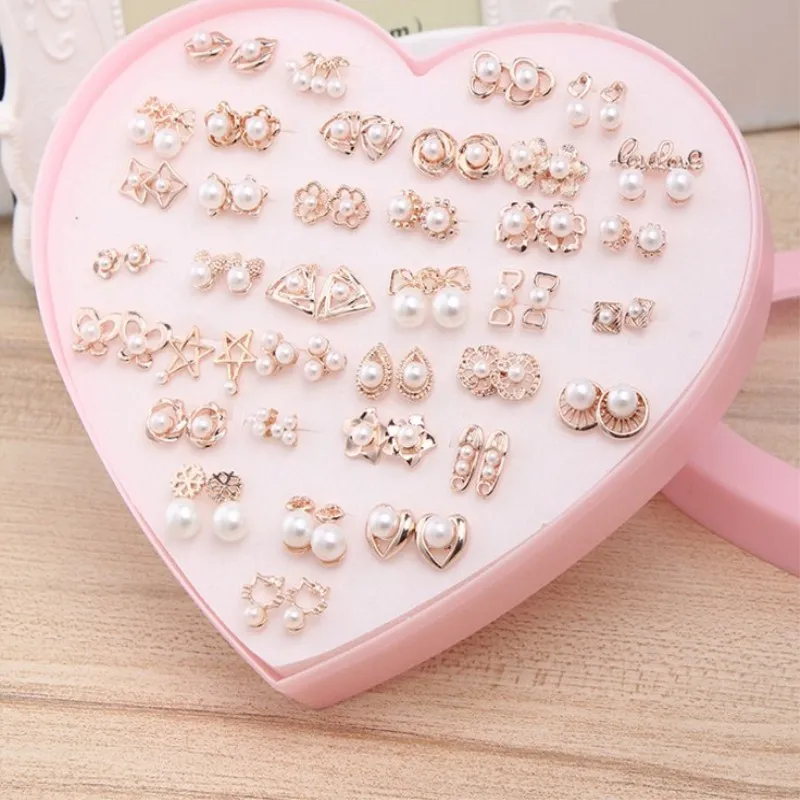 

A box of 36 in different design pattern with a simple stud earrings women exquisite gift of love