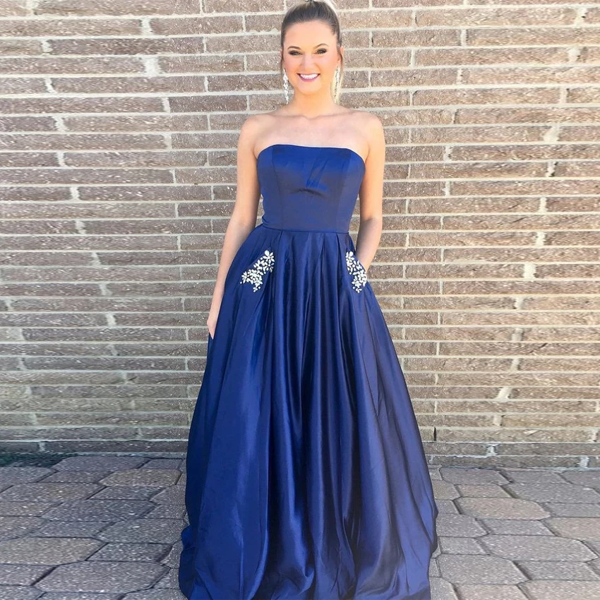 

Elegant Royal Blue Evening Dress with Crystals Pockets Long Strapless Sleeveless A-line Satin Prom Dresses Formal Gown