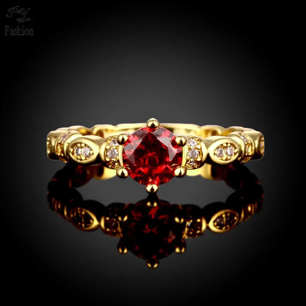 red stone gold ring designs
