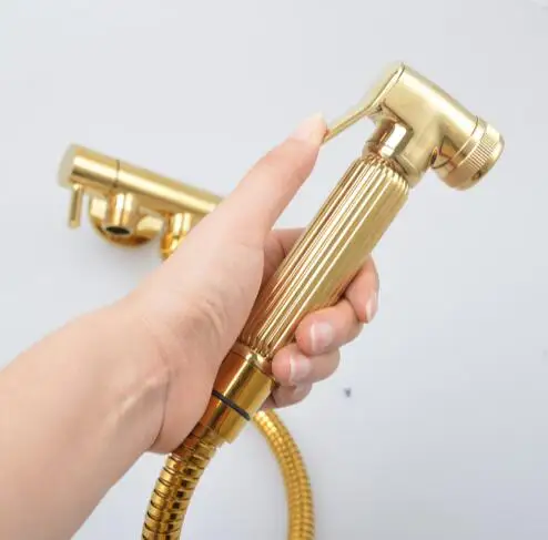 New arrival brass material hand shower head gold finished bidet faucet set with brass gun and 1.5m stainless steel plumbing hose цена New arrival brass material hand shower head gold finished bidet faucet set with brass gun and 1.5m stainless steel plumbing hose цены онлайн