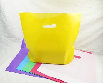 

50pcs Colorful Plastic Shopping Bags with Handle Pink Boutique Clothes Gift Packaging Bag Plastic Shopping Bags Handles